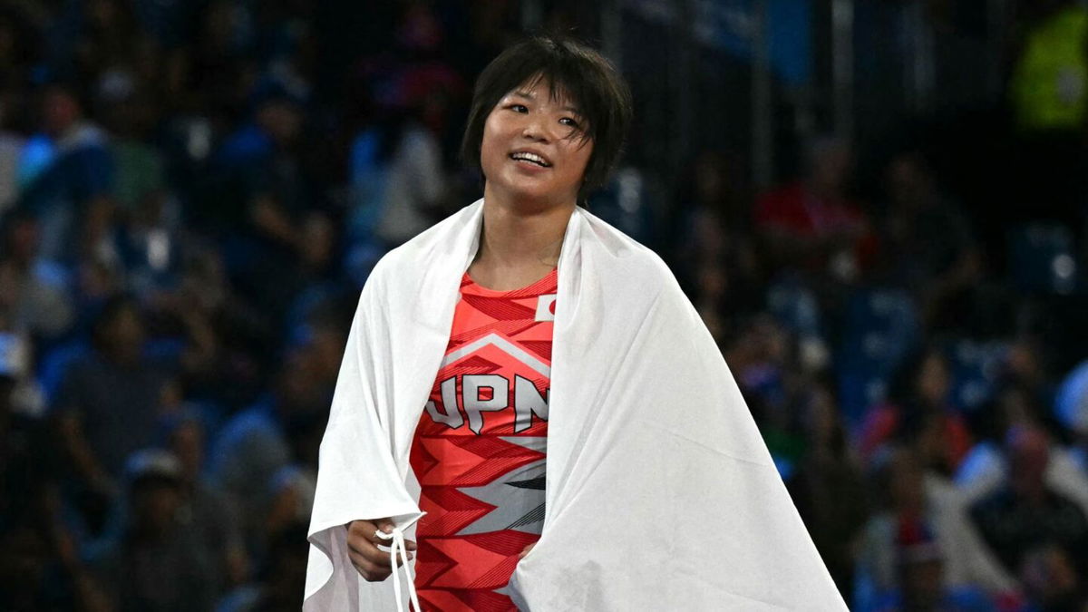 Sakurai wins 57kg wrestling gold