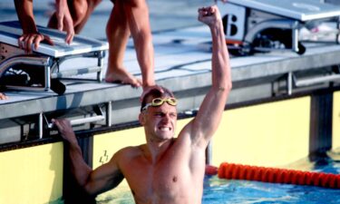 The United States' Ambrose 'Rowdy' Gaines celebrates winning gold after anchoring the 4x100 men's swimming team to victory in the 1984 Los Angeles Olympics.