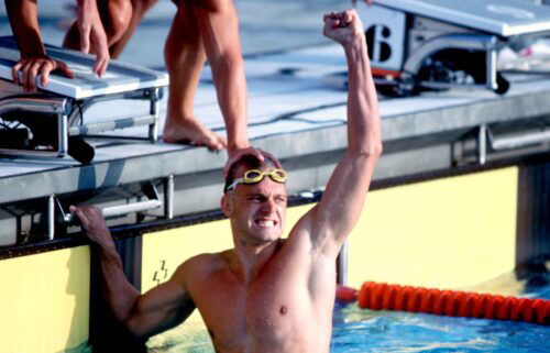 The United States' Ambrose 'Rowdy' Gaines celebrates winning gold after anchoring the 4x100 men's swimming team to victory in the 1984 Los Angeles Olympics.