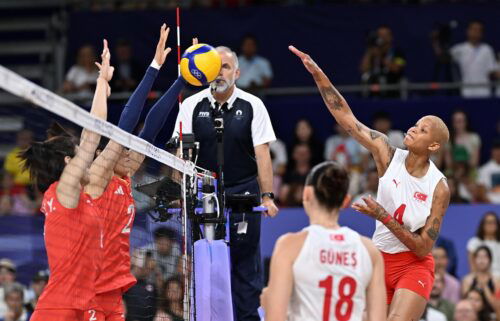 Zehra Gunes and Melissa Teresa Vargas in action during the volleyball women's quarter-final match between China and Turkiye
