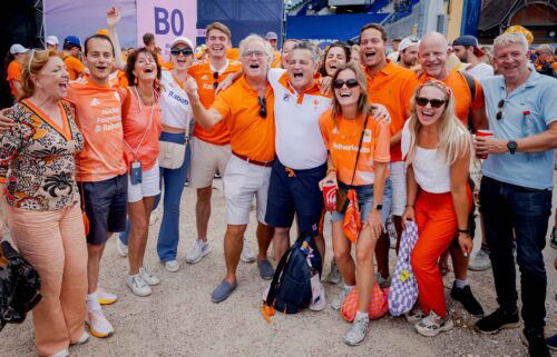 Netherlands women's field hockey coach Paul van Ass with his family during the  Paris Olympics match between the Netherlands and Argentina at the Stade Olympique Yves du Manoir on August 7