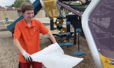 Taylor Rychel cleaning up at Violet Elementary School