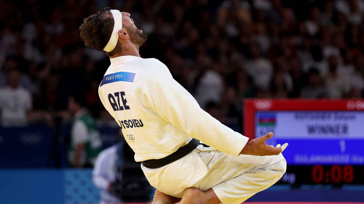 Zelym Kotsoiev of Team Azerbaijan celebrates after winning against Ilia Sulamanidze of Team Georgia during the Judo Men -100 kg Final on day six of the Olympic Games Paris 2024 at Champs-de-Mars Arena on August 01