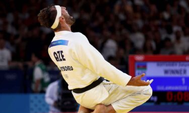 Zelym Kotsoiev of Team Azerbaijan celebrates after winning against Ilia Sulamanidze of Team Georgia during the Judo Men -100 kg Final on day six of the Olympic Games Paris 2024 at Champs-de-Mars Arena on August 01