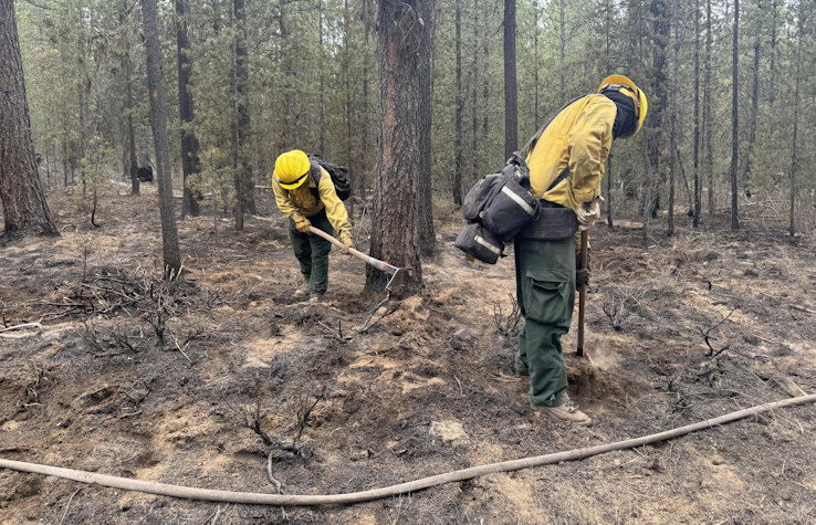 Firefighters mopping up on the northeast edge of the Little Lava Fire on Monday, Sept. 16.