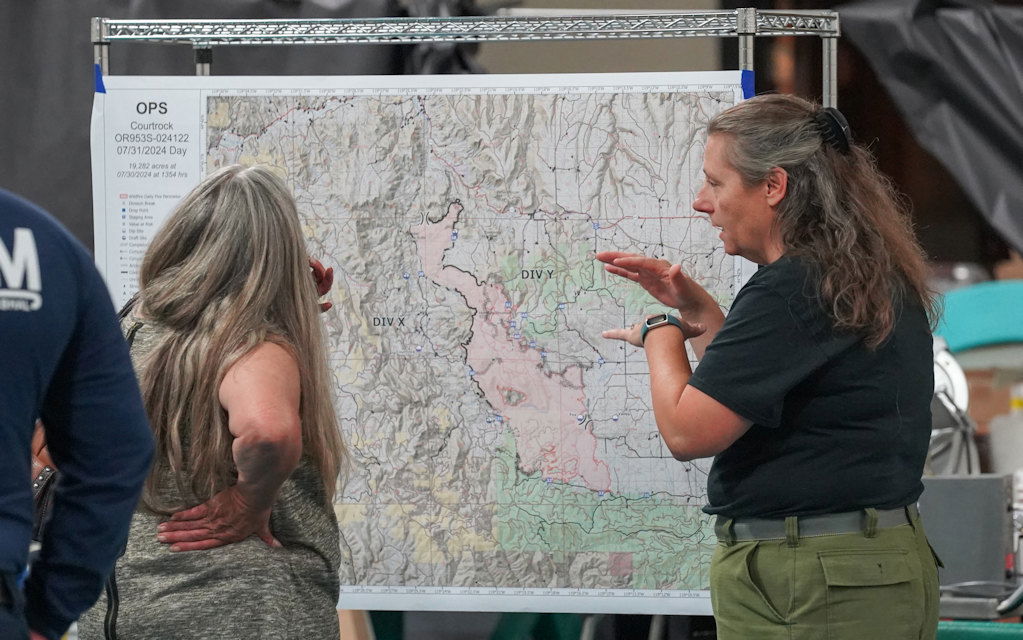 ODF Incident Management Team member answers questions about wildfire at community meeting