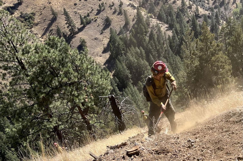 Baker River Hotshots work in steep terrain on the Rail Ridge Fire on Saturday, Sept. 28.