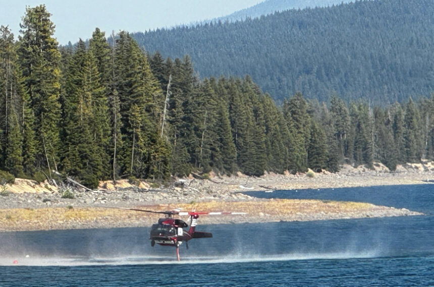 Red Fire helicopter draws water from Crescent Lake 9-24