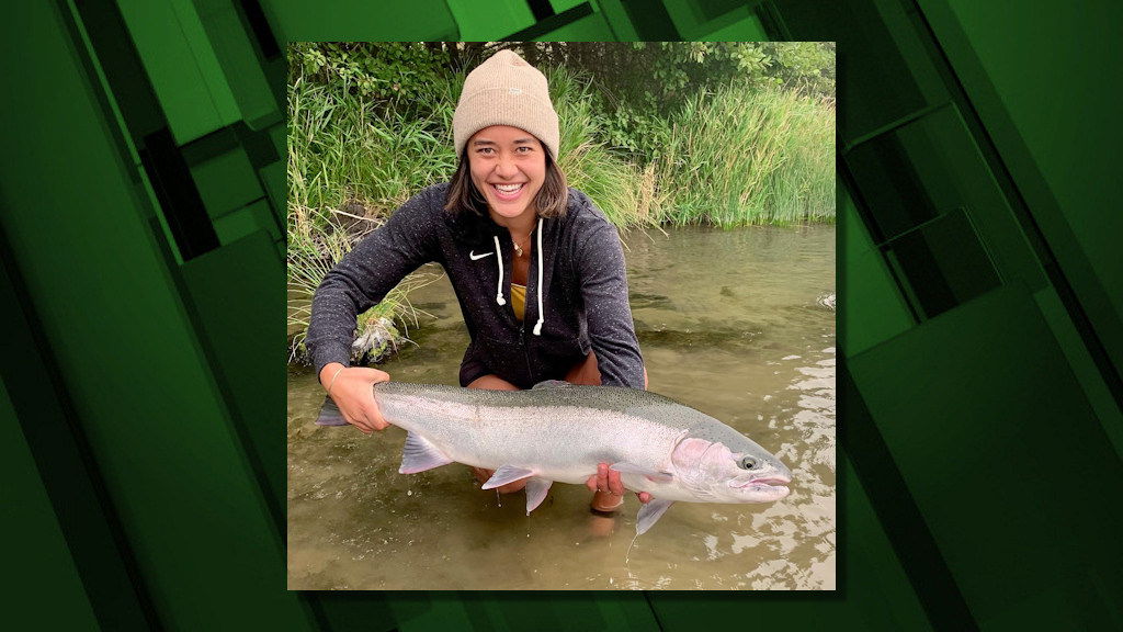 Sarah with a hatchery steelhead, caught on the Deschutes River.