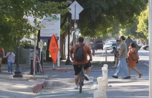 A woman remains in the hospital after she was walking in a crosswalk on Sutterville Road earlier this week. Now the city of Sacramento is considering declaring a state of emergency to fund resources to continue to try to stop pedestrian and cyclist deaths in the city.