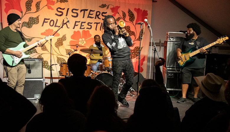 Shamarr Allen and the Underdogs performing at the Sisters Folk Festival. 