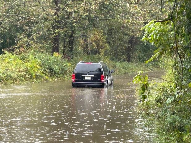 <i>WLOS via CNN Newsource</i><br/>A family rescued a driver from floodwaters as Helene hit Transylvania County