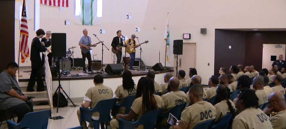 <i>WBBM via CNN Newsource</i><br/>Actor Kevin Bacon came to perform alongside his brother at at the Cook County Jail.