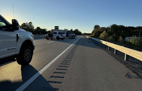 Authorities block traffic on Interstate 75 in Kentucky on Saturday.