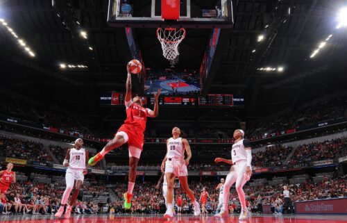 The Fever's NaLyssa Smith scores a layup during the matchup.