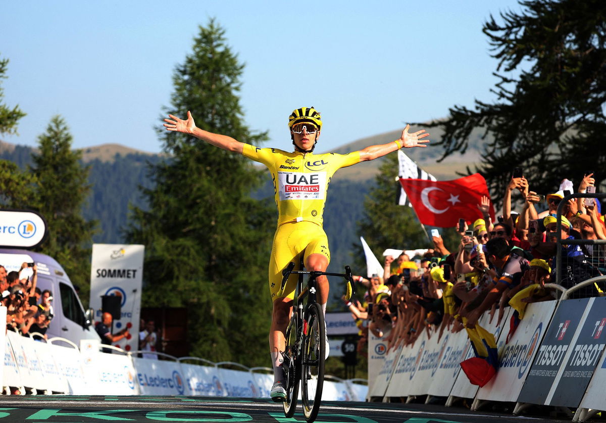 <i>Manon Cruz/Reuters via CNN Newsource</i><br/>Tadej Pogačar celebrates winning stage 20 of this year's Tour de France.