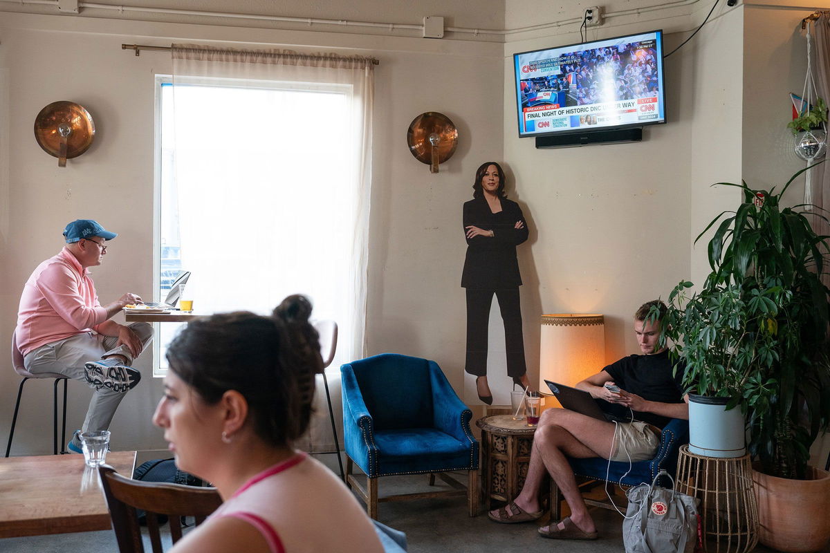 <i>Loren Elliott/Getty Images via CNN Newsource</i><br/>A cut-out depiction of Kamala Harris is seen before a Democratic National Convention watch party at Manny's