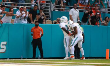 Hill and Jaylen Waddle celebrate Hill's third-quarter touchdown against the Jacksonville Jaguars.