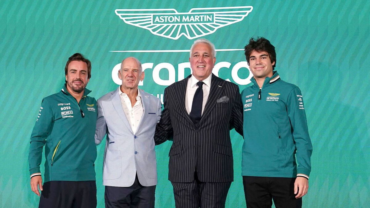 <i>Bradley Collyer/PA/AP via CNN Newsource</i><br/>Aston Martin drivers Fernando Alonso (left) and Lance Stroll (right) with Adrian Newey (center left)