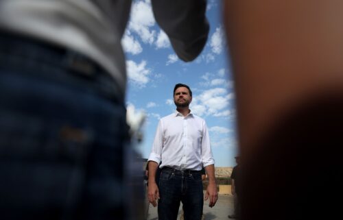 Republican vice presidential nominee JD Vance speaks to reporters in front of the border wall with Mexico in San Diego on September 6.