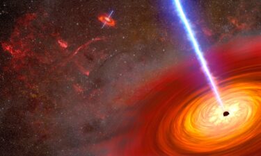 An artist's concept illustrates a pair of merging black holes.