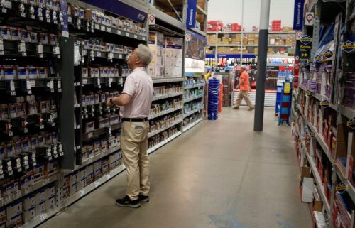 A customer shops in a Lowe's home improvement store in Los Angeles on August 20.