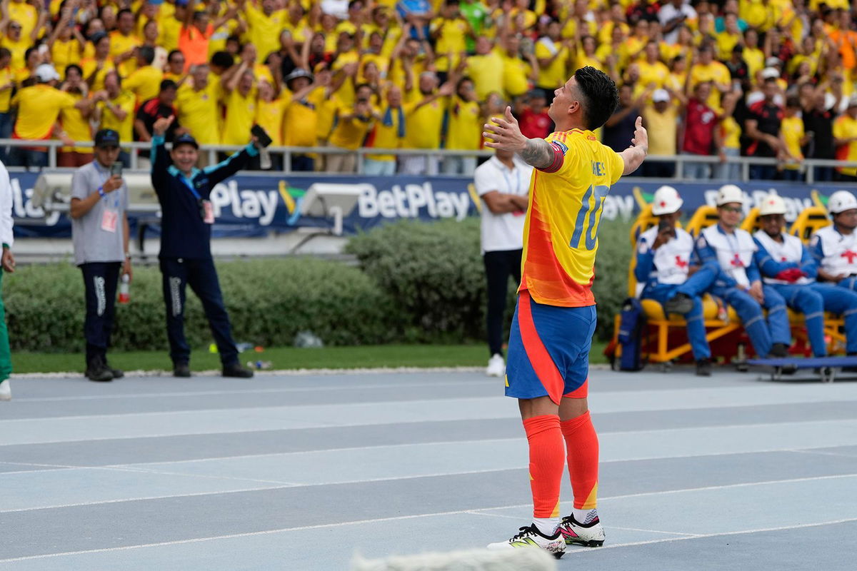 <i>Ricardo Mazalan/AP via CNN Newsource</i><br/>Rodríguez celebrates giving Colombia a 2-1 lead against Argentina.