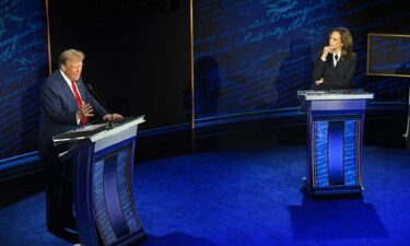 Kamala Harris listens as Donald Trump speaks during the ABC presidential debate in Philadelphia on Tuesday