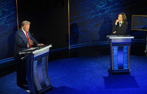 Kamala Harris listens as Donald Trump speaks during the ABC presidential debate in Philadelphia on Tuesday