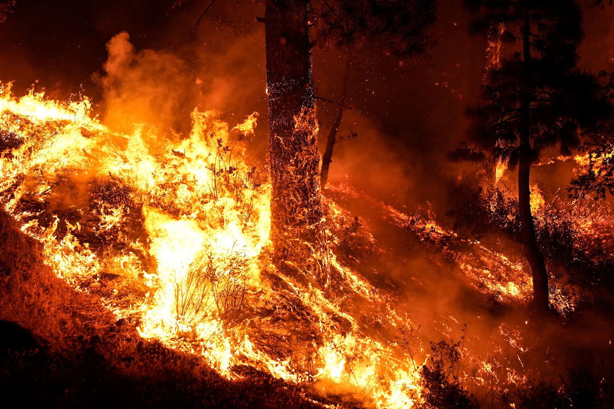 <i>Jae C. Hong/AP via CNN Newsource</i><br/>The Bridge Fire spread rapidly in Southern California September 10.