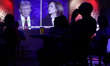 People watch the ABC presidential debate during a watch party at Penn Social on September 10