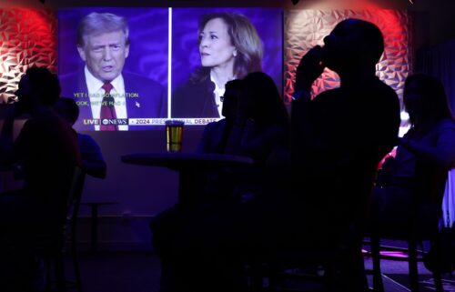 People watch the ABC presidential debate during a watch party at Penn Social on September 10