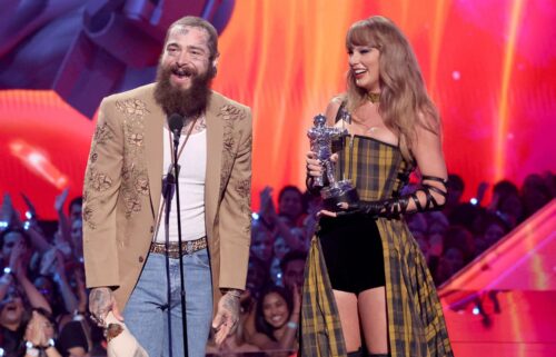 Post Malone and Taylor Swift accept the Best Collaboration award for "Fortnight" on stage during the 2024 MTV Video Music Awards at UBS Arena on September 11 in Elmont