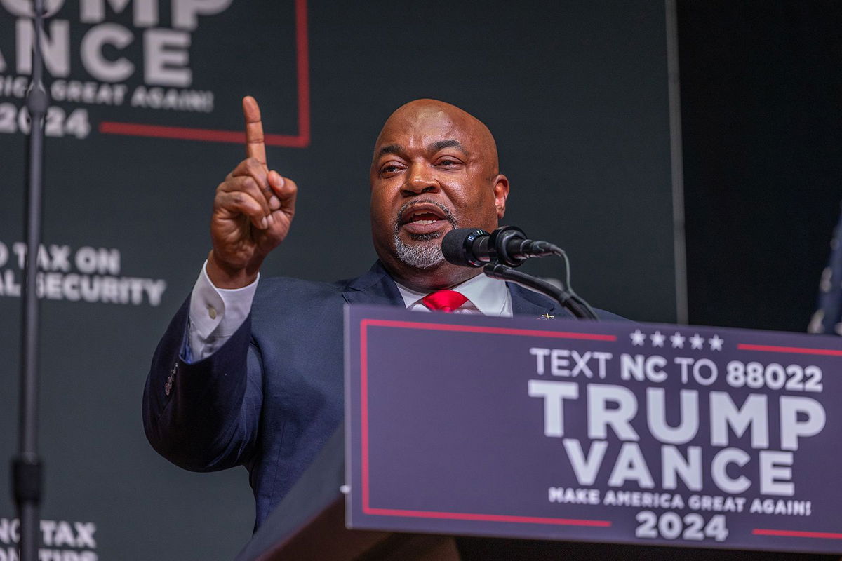 <i>Grant Baldwin/Getty Images via CNN Newsource</i><br/>North Carolina Lt. Gov. Mark Robinson speaks at a campaign event for former President Donald Trump in Asheville on August 14.