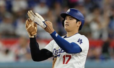 Los Angeles Dodgers superstar Shohei Ohtani reacts after stealing second base during a game against the Chicago Cubs.