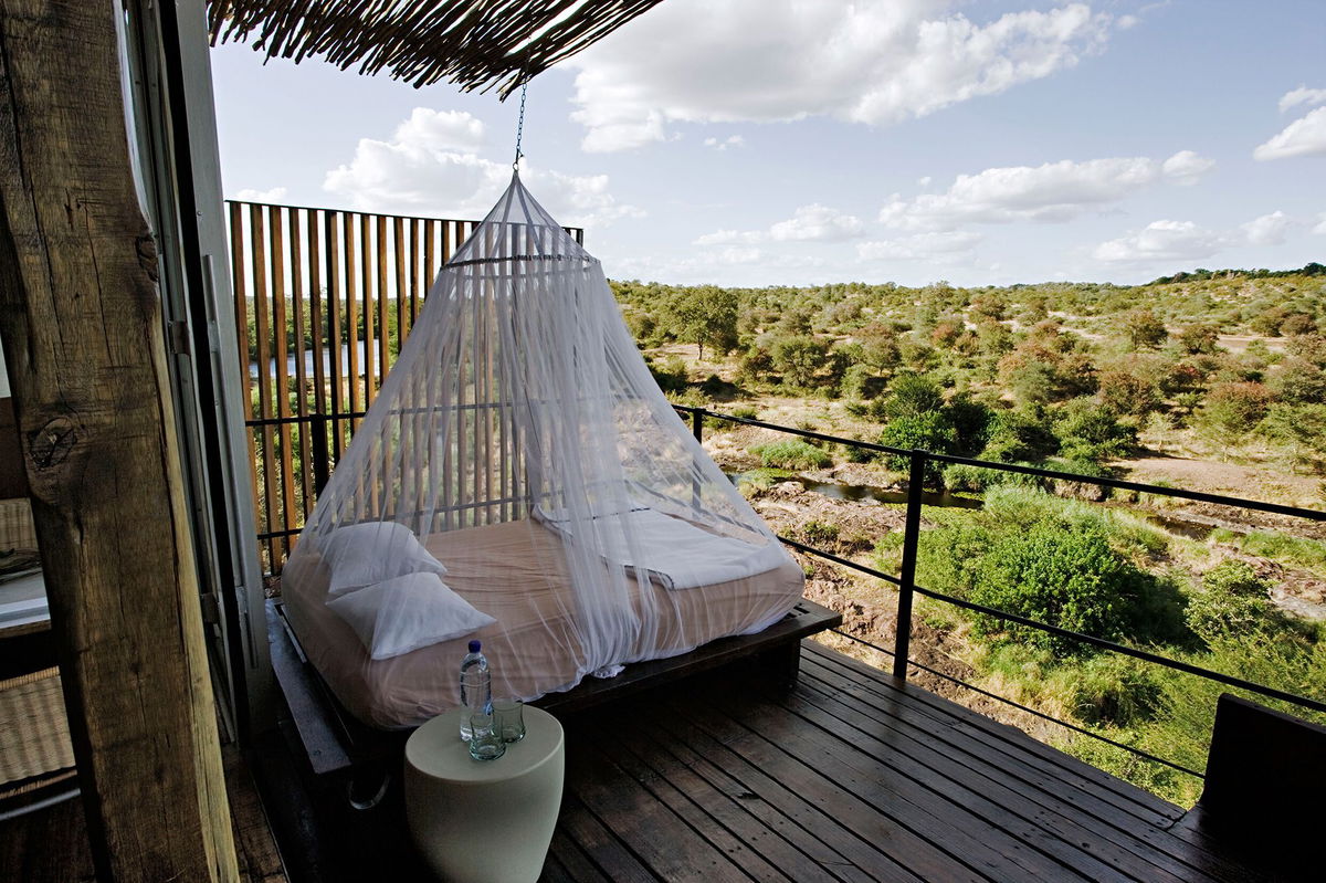 <i>Martin Harvey/The Image Bank Unreleased/Getty Images via CNN Newsource</i><br/>A mosquito net hanging over a day bed on the viewing deck of a luxury cliffside suite in South Africa.