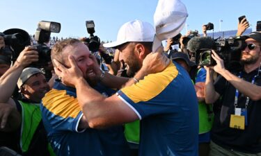 Lowry (L) and Rahm (R) celebrate triumph over the United States in Rome.