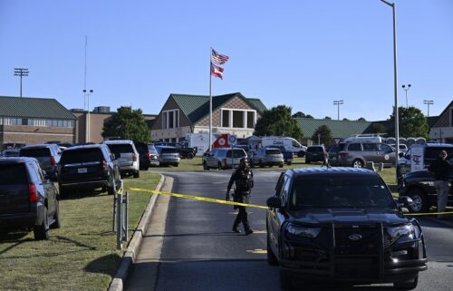 Measures are taken by security forces on the scene of a mass shooting at Apalachee high school in Winder