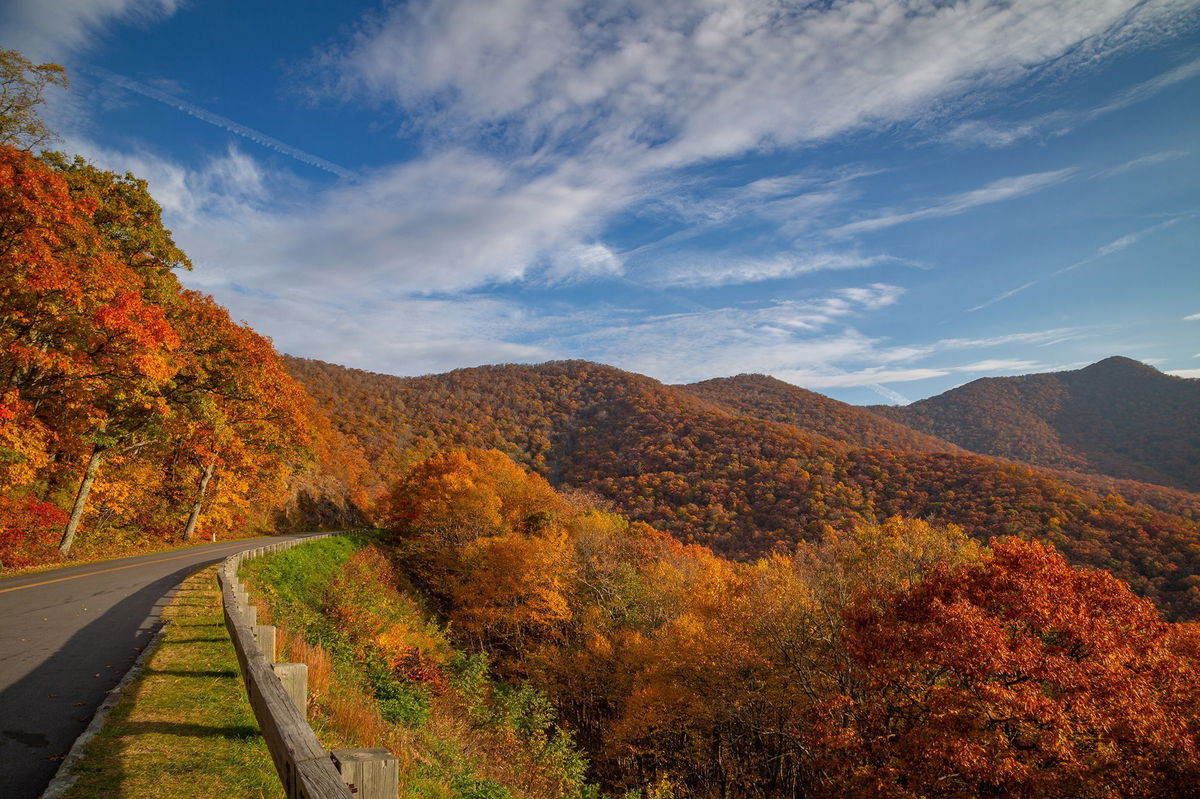 <i>Cindy Robinson/Moment RF/Getty Images via CNN Newsource</i><br/>An autumn blaze of color emerges from the mountainside of the Blue Ridge Parkway in North Carolina.