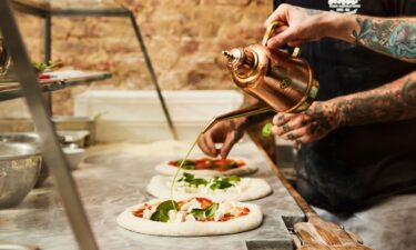 The olive oil – and the praise – flows Una Pizza Napoletana in New York City.