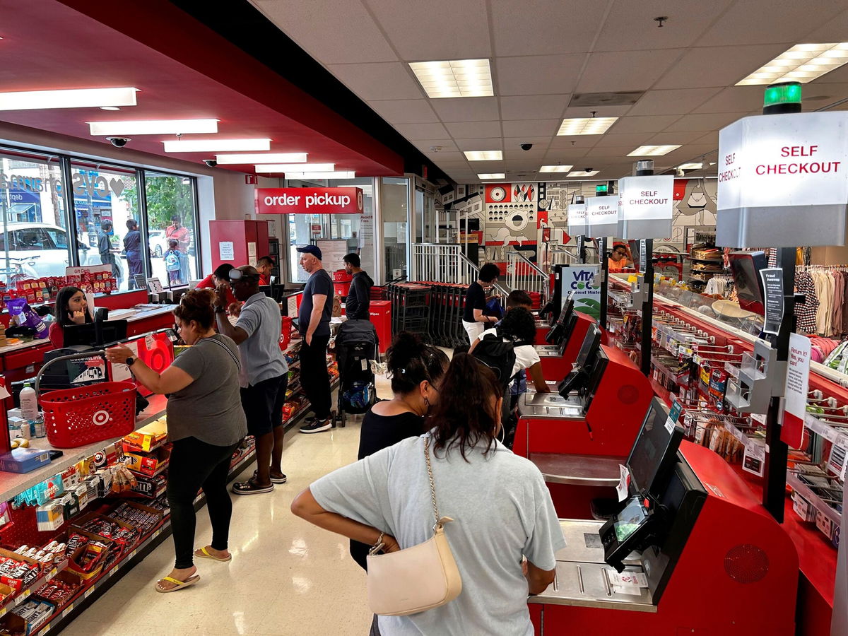 <i>Lindsey Nicholson/UCG/Universal Images Group/Getty Images via CNN Newsource</i><br/>Busy Self checkout vs busy cashier check out at Target Store