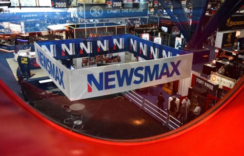 A Newsmax booth broadcasts at the National Rifle Association annual convention in Houston on May 29