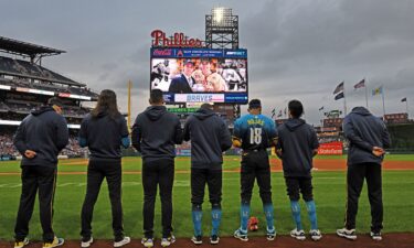 The Philadelphia Phillies observe a moment of silence in honor of the Gaudreau brothers before a game against the Atlanta Braves at Citizens Bank Park in Philadelphia on August 30.