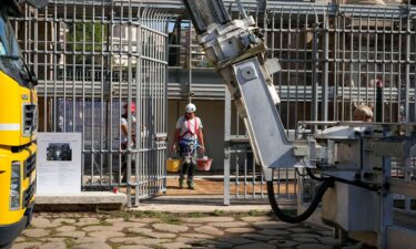 Workers collected fragments and secured the area around the monument