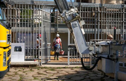 Workers collected fragments and secured the area around the monument