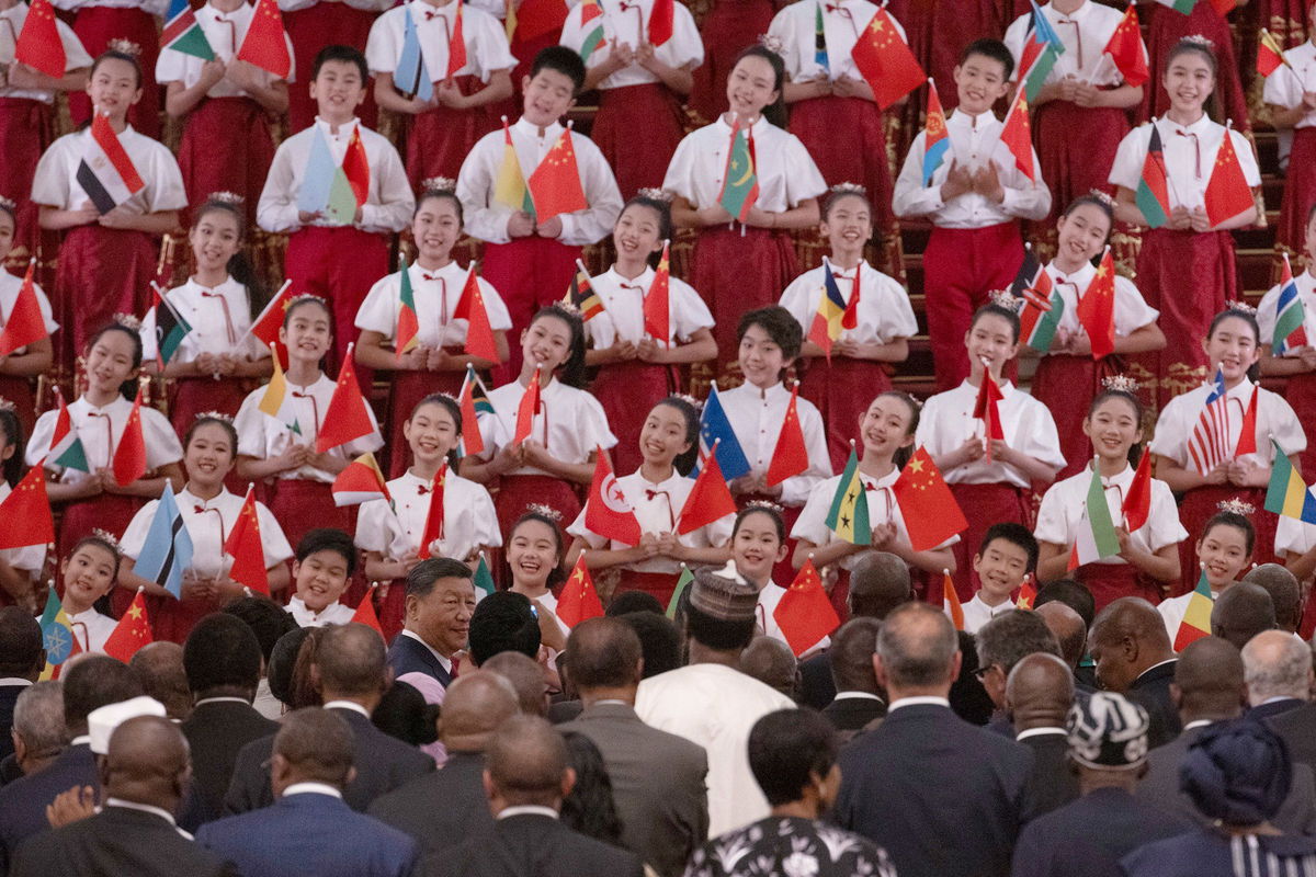 <i>Andres Martinez Casares/Pool/Getty Images via CNN Newsource</i><br/>Xi and leaders of African countries listen to children sing during a reception at the Forum on China-Africa Cooperation (FOCAC) on September 4 in Beijing.