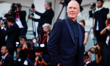 Michael Keaton poses on the red carpet during arrivals for the screening of the film "Beetlejuice Beetlejuice" in Venice