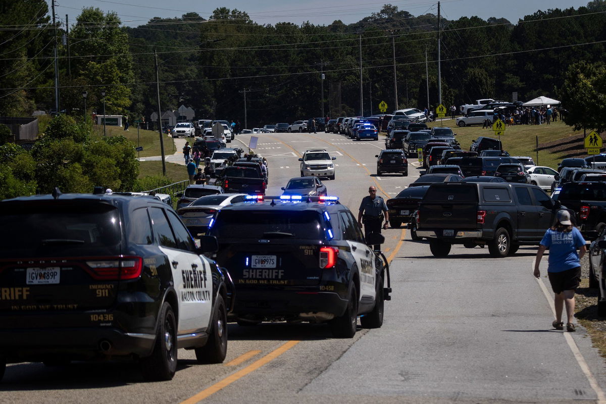 <i>Christian Monterrosa/AFP/Getty Images via CNN Newsource</i><br/>Authorities found documents that they believe reference past school shootings in the home of the 14-year-old accused of shooting at Apalachee High School