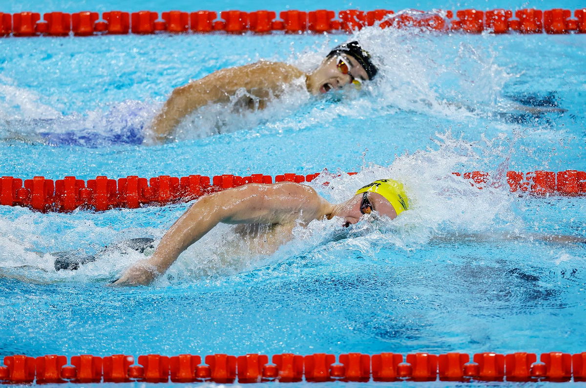 <i>Ueslei Marcelino/Reuters via CNN Newsource</i><br/>Australia's Sam Short and Korea's Kim Woo-min (top) compete in the 400-meter freestyle heats in Paris.