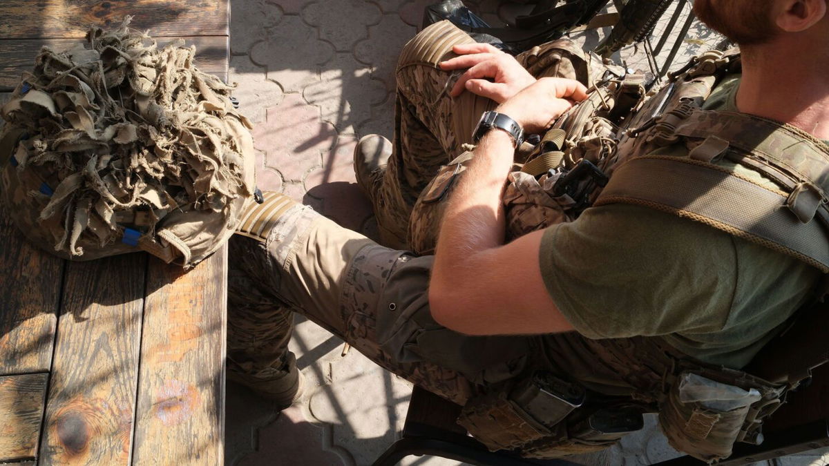 <i>Ivana Kottasova/CNN via CNN Newsource</i><br/>A group of Ukrainian soldiers rests after completing a long mission in Russia's Kursk region.